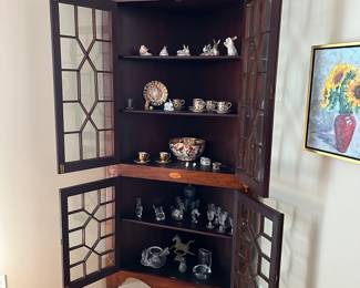 T9 - $395. Antique Corner Cabinet. Measures 36" across the front x 91" tall. Comes out from the corner 26.5".  Bottom right corner has a couple broken pieces of glass. Glass is original and is wavy. 