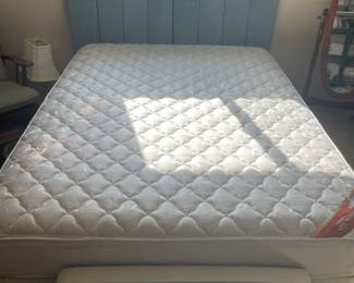 Queen size Serra bed with blue upholstered headboard $300.00