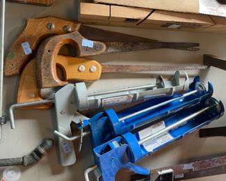 Saws and caulking guns