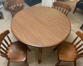 Kitchen Table 4 chairs and a leaf $ 150.00                                       Table 47.5" diameter 30"t leaf 10"w