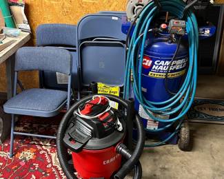 metal folding chairs, Craftsman wet/dry vac, Campbell Hausfeld air compressor
