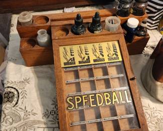 General store oak needlepoint pen display