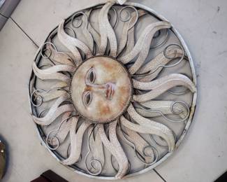 Large decorative metal suns