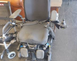 Electric wheelchair with charger working