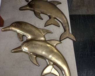 Large solid brass dolphins