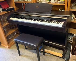 Yamaha Digital Piano YDP 223, 88 key, graded hammer, Dark rosewood woodgrain cabinet w/ sliding key cover. Bench. Like new. Never needs tuning easy to move.