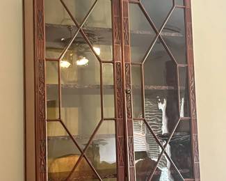 Original glass panels and brass lockong rails…glass of varying thicknesses features bubbles and lines from the 18th or 19th C