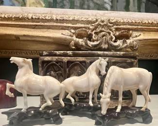Set of three I Vory horses on fitted elmwood stands circa 1790-1820