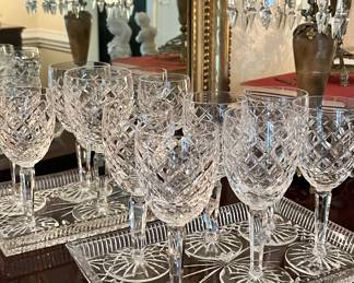 Old Waterford cut by hand.  Hand cut Waterford will have varying size stems in width and height and some the cups will also be non uniform in size.