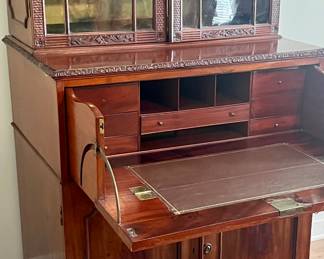 Hand-carved detail and solid mahogany from England 