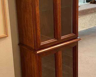 Very Clean wood and glass Display Cabinet.