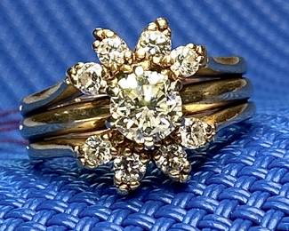 Stunning VS2-VS1 Round Brilliant approximately 1 Carat  Solitaire Diamond Ring with 8 accent Diamonds in Ring guard. Excellent for and engagement and or wedding ring, or separate for a solitaire setting.