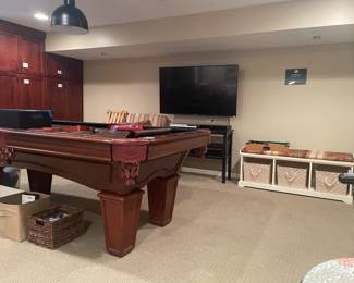 Storage Bench, Sony, Toshiba DVD Player, Mini Pool Table, Sony Blu-Ray DVD Player. Console table, Striped accent chair,  L.L. Bean kids pull sled, Brunswick 7ft pool table set (BL), Squier Fender acoustic guitar