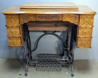Antique Brunswick Sewing Machine And Table With Treadle, 31" x 34.5" x 19"