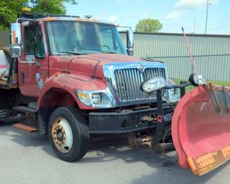 2005 International 7300 Flatbed Truck, VIN# 1HTWAAANX5J036788, With 6 Cylinder A 7.6L FI Turbo Diesel 466 CID, Mileage Showing 62727, Includes Plow And Monroe Spreader V Box, Kansas Title, City Of Shawnee, KS Surplus