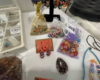 We have lots of Pandora "like" beads and charms.  If you like to make jewelry, we can help you out!