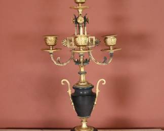 A 19th century Neoclassical Bronze candelabrum. Five light design with scrolled arms over an urn form Slate stem and stepped Slate base with cast feet. Wear to patina, some oxidation, slate with some chips and flakes. 8 x 8 x 19" high overall. NOTE: This lot picks up from the home in Coldwater, Michigan.