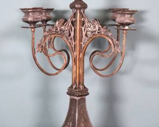 A late 19th century Art Nouveau Pewter candelabrum. Five light design with scrolled Grape Vine arms and pierced foot. Some oxidation, wear to original Gilded finish at stem, deep scratches to bobeches and removable holders. 17 x 17 23 1/2" high overall. ESTIMATE $50-100 NOTE: This lot picks up from the home in Coldwater, Michigan.
