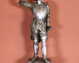 A 19th century Victorian Period Spelter figure of a Musketeer with Silvered finish, titled "Don Caesar" at base. Lacks blade of sword, some wear to patina. 7 x 5 1/2 x 21" high overall. ESTIMATE $50-75 NOTE: This lot picks up from the home in Coldwater, Michigan.