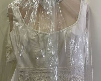 Wedding dress is a size 8 by Christos.