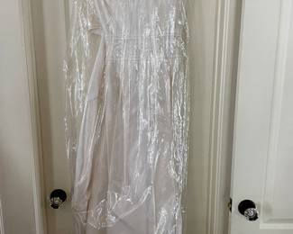 Wedding dress is a size 8 by Christos.