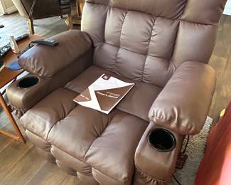 Beautiful, leather Mcombo power lift recliner with heat and massage. Like new condition.