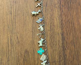 Gold charm bracelet.