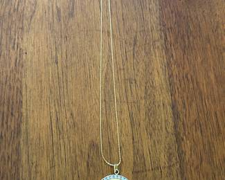 Gold pendant.