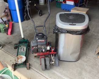 Car jack, lawn trimmer, larger kitchen garbage can