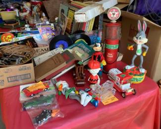Collectible Texaco gas pump bank, Bugs Bunny bank, Pepsi truck bank, Bugs Bunny statute, Goofy, Charlie Brown, miniature metal trucks, Tonya glass caterpillar paperweight