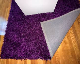 Deep purple shag area rug