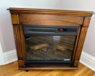 Electric fireplace, on casters
