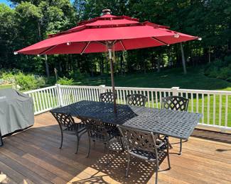 Cast aluminum large table, 6 chairs, Sunbrella umbrella and stand