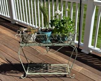 Metal planter with 3 potted plants
