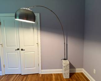 Arco stainless steel lamp on marble base