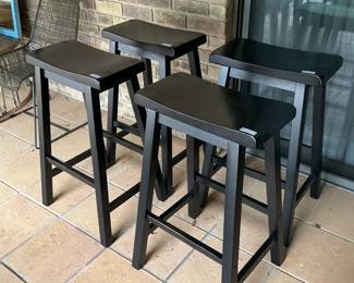Black wooden bar stools