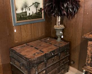 Rustic antique trunk;  one of two feathered arrangements