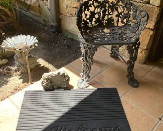 One of several wrought iron chairs