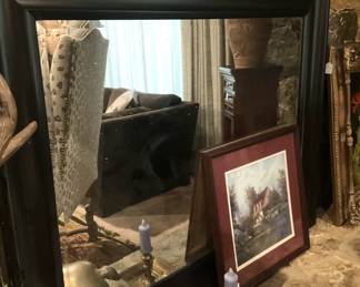 Large black framed mirror