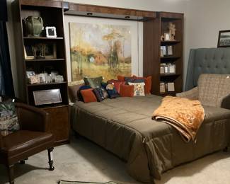 King bed and bookshelf unit