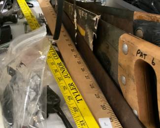 Yard sticks; hand saws