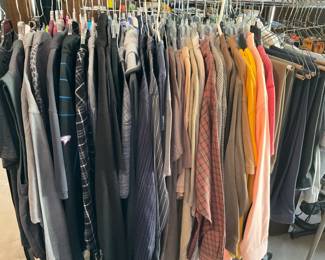 Many men's clothes in the garage AND master bedroom closet