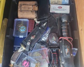 tons of smalls, lighters,  jewelry,  knives,  fishing reels, endless weird items for all!