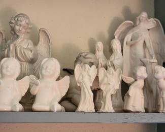 Several collections of cherub figurines
