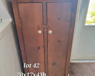 Handmade pine cabinet with porcelain knobs