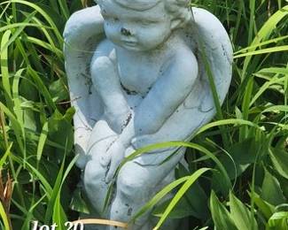 Concrete cherub statue