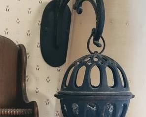 Wall mount string holder