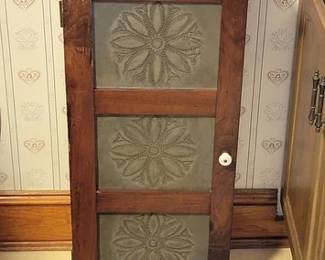 Pine wall cabinet with punch tin panels