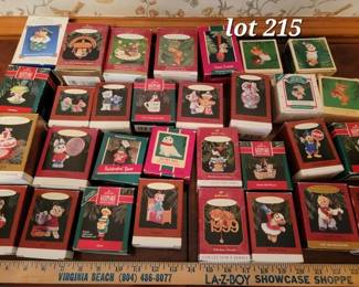 Large collection of Hallmark ornaments with boxes