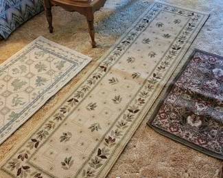 Throw rugs, maple coffee table